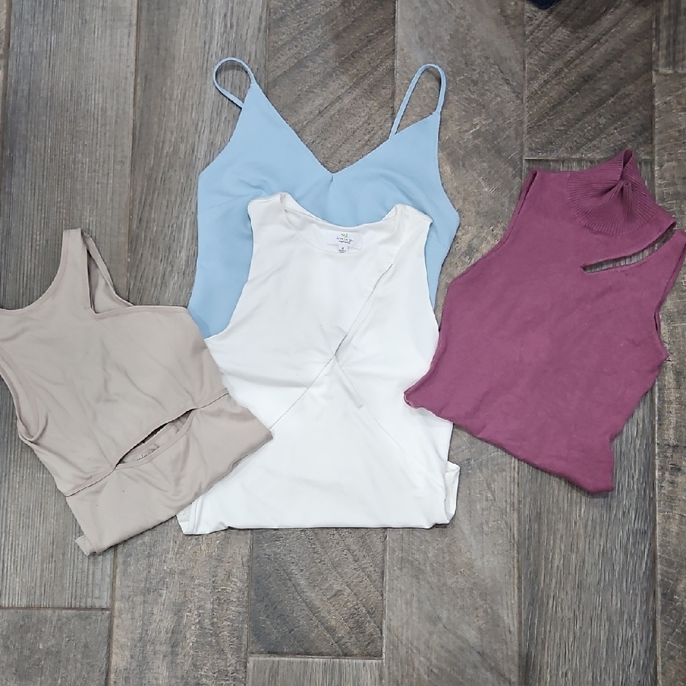 Lot Of 4 Womens Bodysuits- All Size Medium